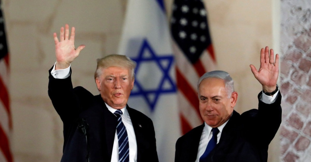 U.S. President Donald Trump and Israeli Prime Minister Benjamin Netanyahu wave at onlookers, Jerusalem, May 23, 2017.