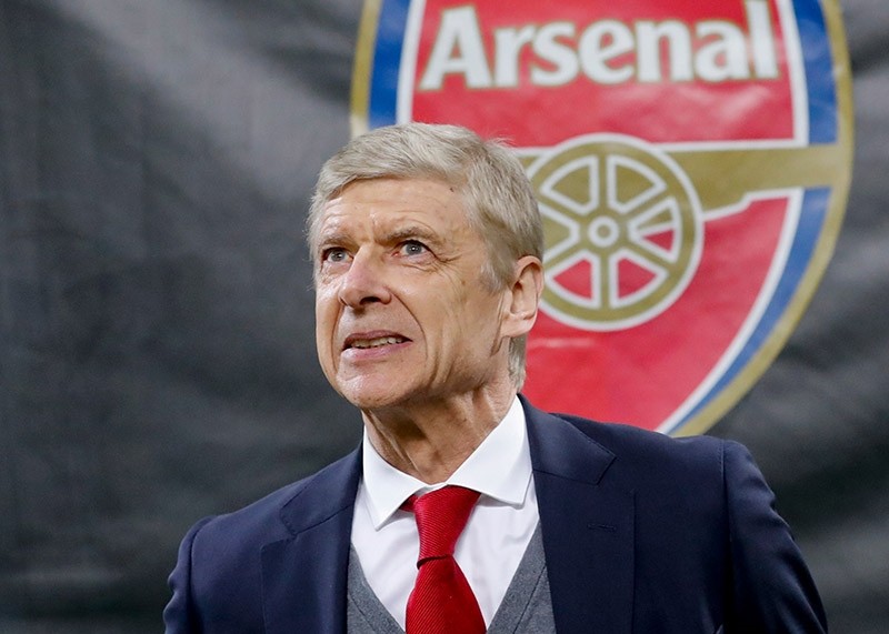 In this Thursday, March 8, 2018 file photo Arsenal's manager Arsene Wenger waits for the kick-off of the Europa League, round of 16 first-leg soccer match between AC Milan and Arsenal, at the Milan San Siro stadium, Italy. (AP Photo)