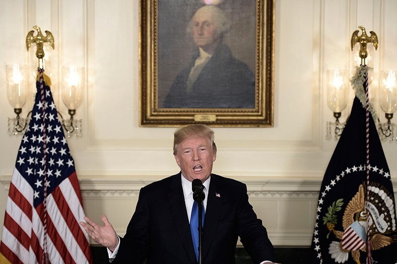 US President Donald Trump speaks about the Iran deal from the Diplomatic Reception room of the White House in Washington, DC, on October 13, 2017 (AFP Photo)
