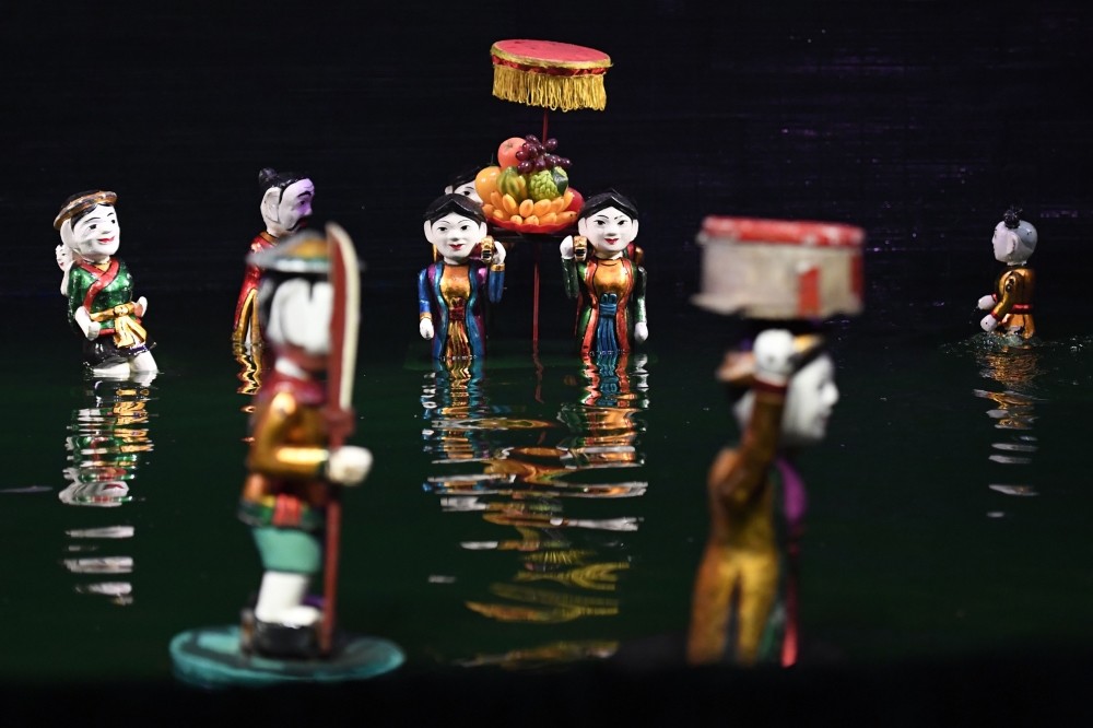 Water puppets performing at the Thang Long theatre in Hanoi.
