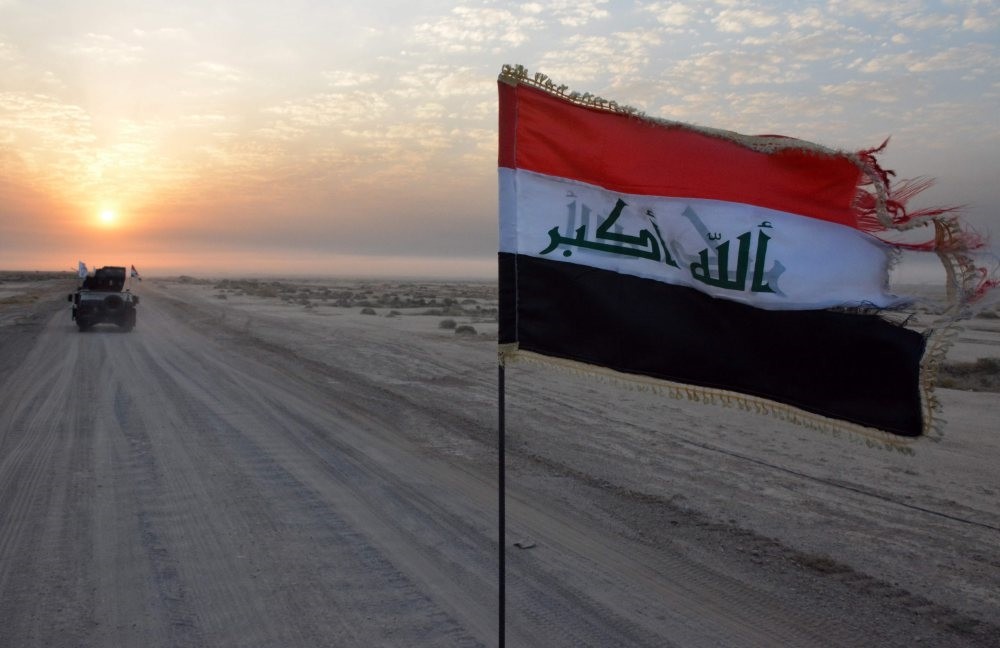 Iraqi government forces patrol in military vehicles in Salaheddin province as they take part in an offensive against the Daesh terrorist group, October 2016. 