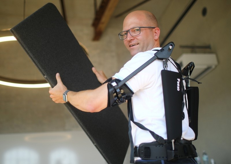 Soenke Rossing, Head of Industrials unit at German prosthetic limb maker Ottobock, presents an exoskeleton of the company during an interview with Reuters in Berlin, Germany, August 23, 2018. (Reuters)