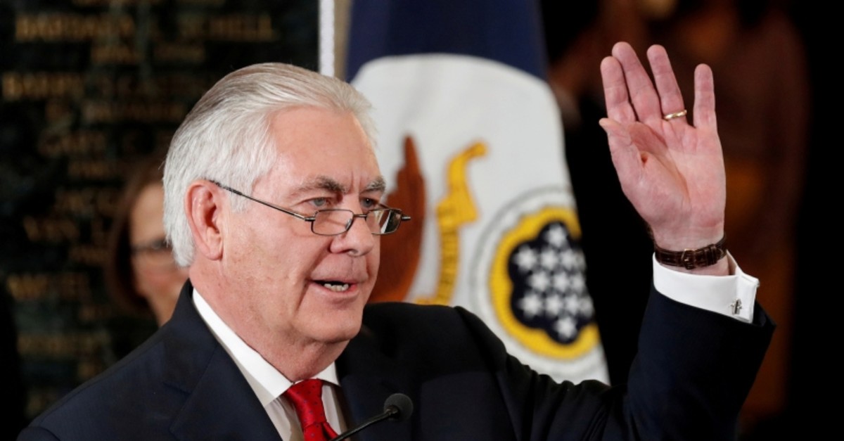 Outgoing U.S. Secretary of State Rex Tillerson waves to applauding workers after delivering his parting remarks at the State Department in Washington, U.S., March 22, 2018. (Reuters Photo)
