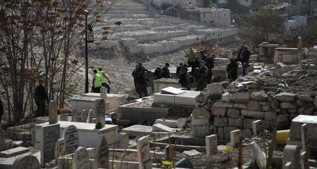 Israeli forces are seen at Bab al-Rahma cemetery in East Jerusalem on Dec. 10, 2017. (AA Photo)
