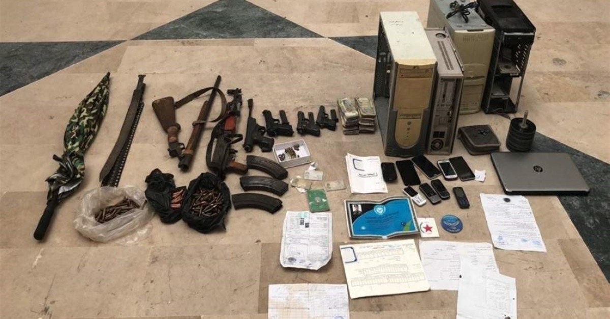 Arms and supplies belonging to YPG/PKK terrorists confiscated by Turkish soldiers in Tal Abyad, Syria (IHA Photo)