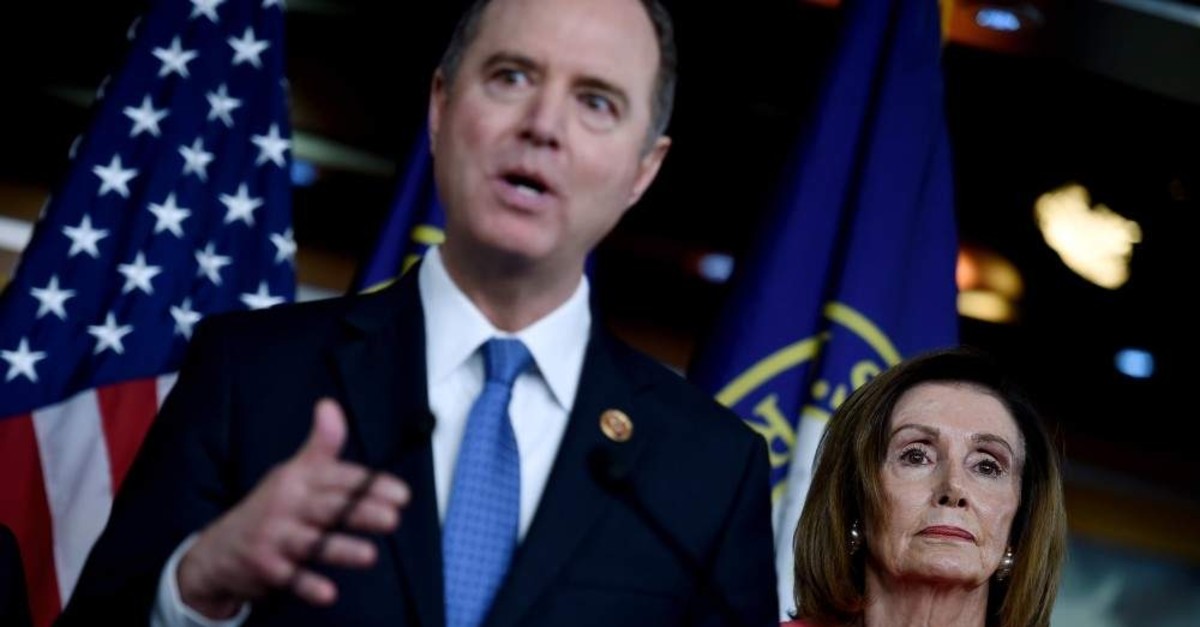 House Intelligence Committee Chairman Adam Schiff (D-CA) (C) speaks after US Speaker of the House Nancy Pelosi (D-CA) (R) announces that he and six additional members will be managers of the Senate impeachment trial of President Donald Trump at the US Capitol Jan. 15, 2020 in Washington, DC. (AFP Photo)