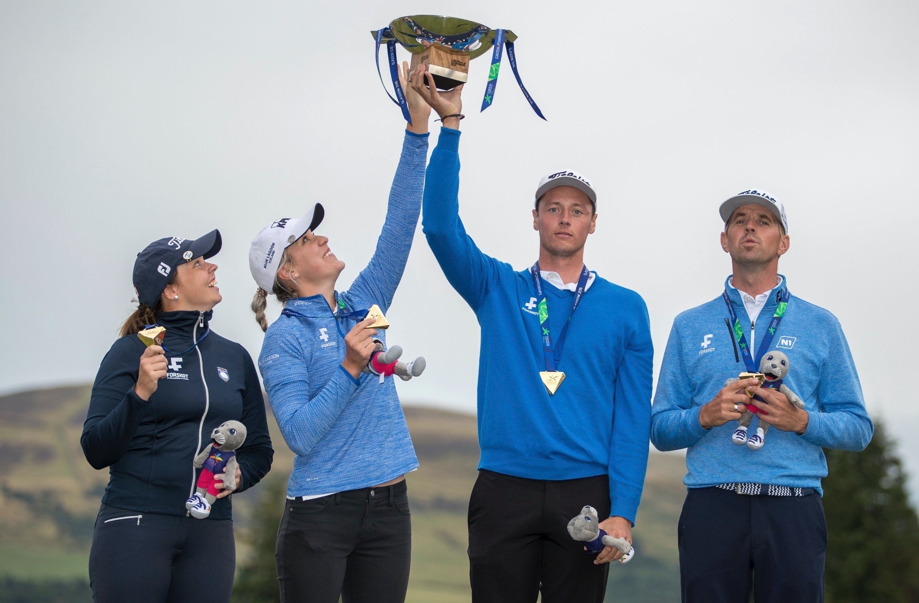 Team Iceland pose with their gold medals and the trophy after their victory during the European Championships at Gleneagles PGA Centenary Course, Scotland.