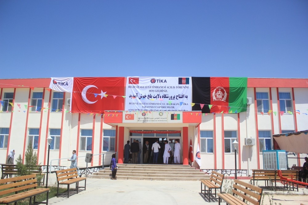 Turkish, Afghan flags adorn the exterior of orphanage (AA Photo).