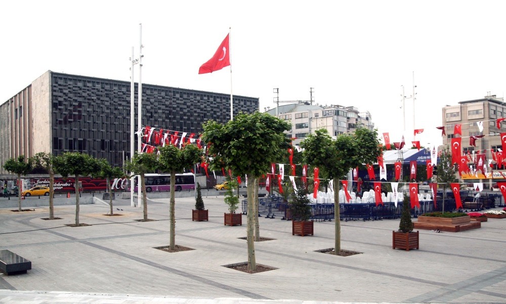 Workers planted plane, lime and olive trees in the square.