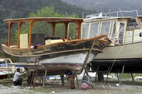 Tour boats on the Dalyan Canal are put under meticulous maintenance at the local boat yard.