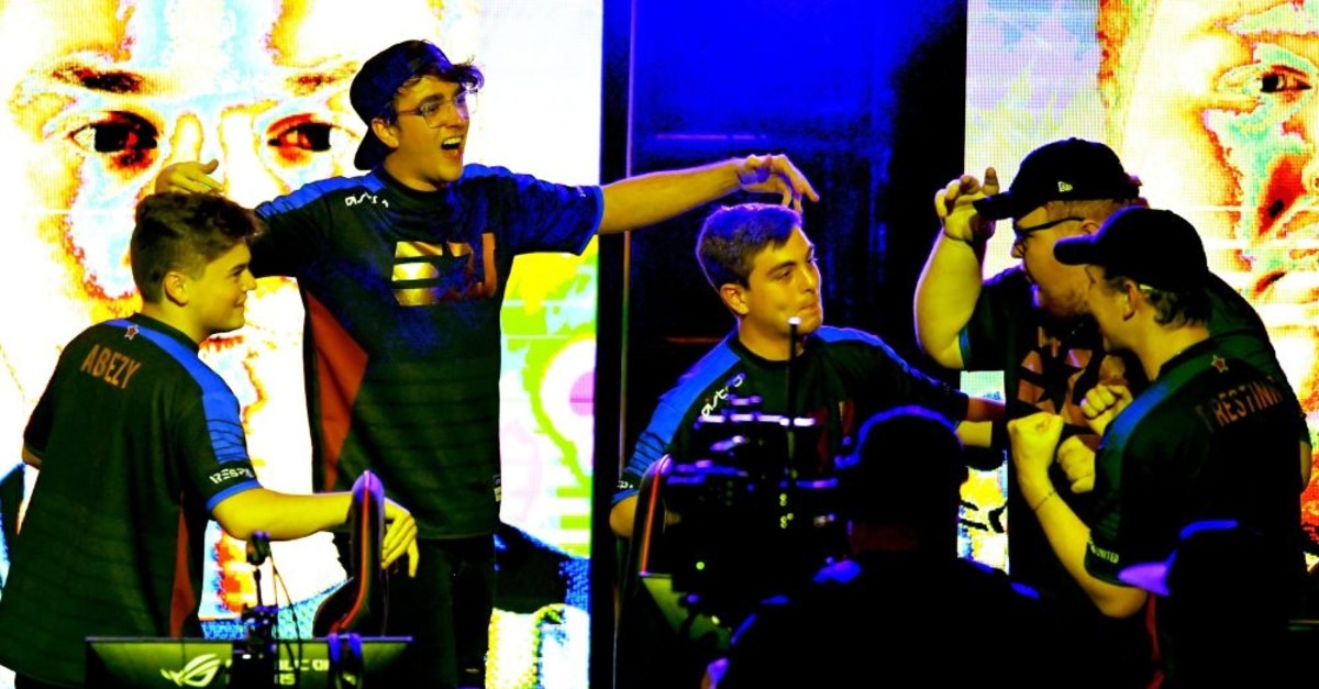 Team eUnited celebrates after they defeated 100 Theives at the Call of Duty World League Championship, California, Aug. 16.