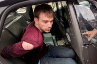 Travis Reinking, the suspect in a Waffle House shooting in Nashville, is under arrest by Metro Nashville Police Department in a wooded area in Antioch, Tennessee, U.S., April 23, 2018. (REUTERS Photo)