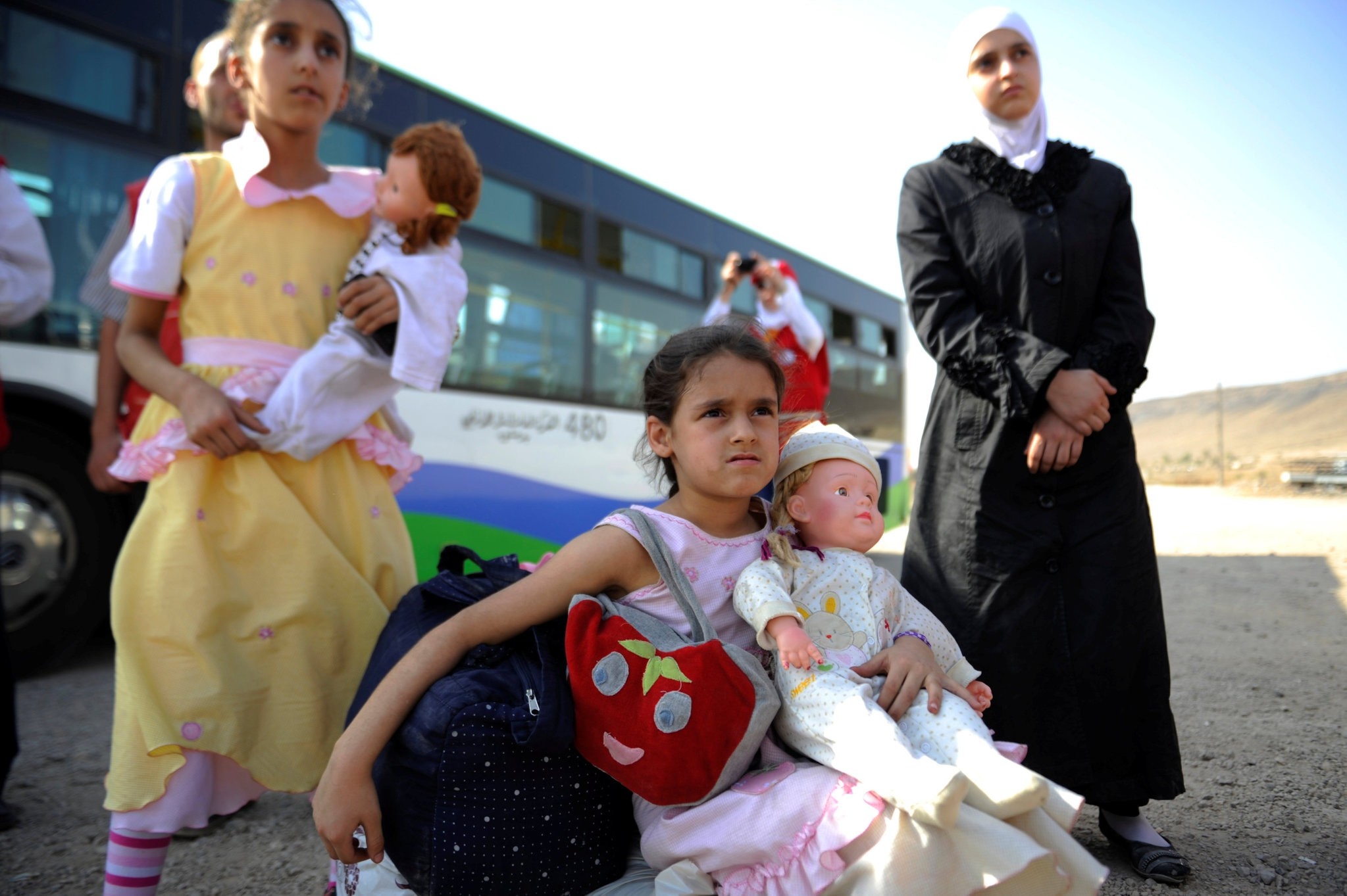 Girls that were evacuated from the besieged Damascus suburb of Daraya arrive to a camp inside Herjalleh suburb of Damascus, August 27, 2016. (REUTERS Photo)