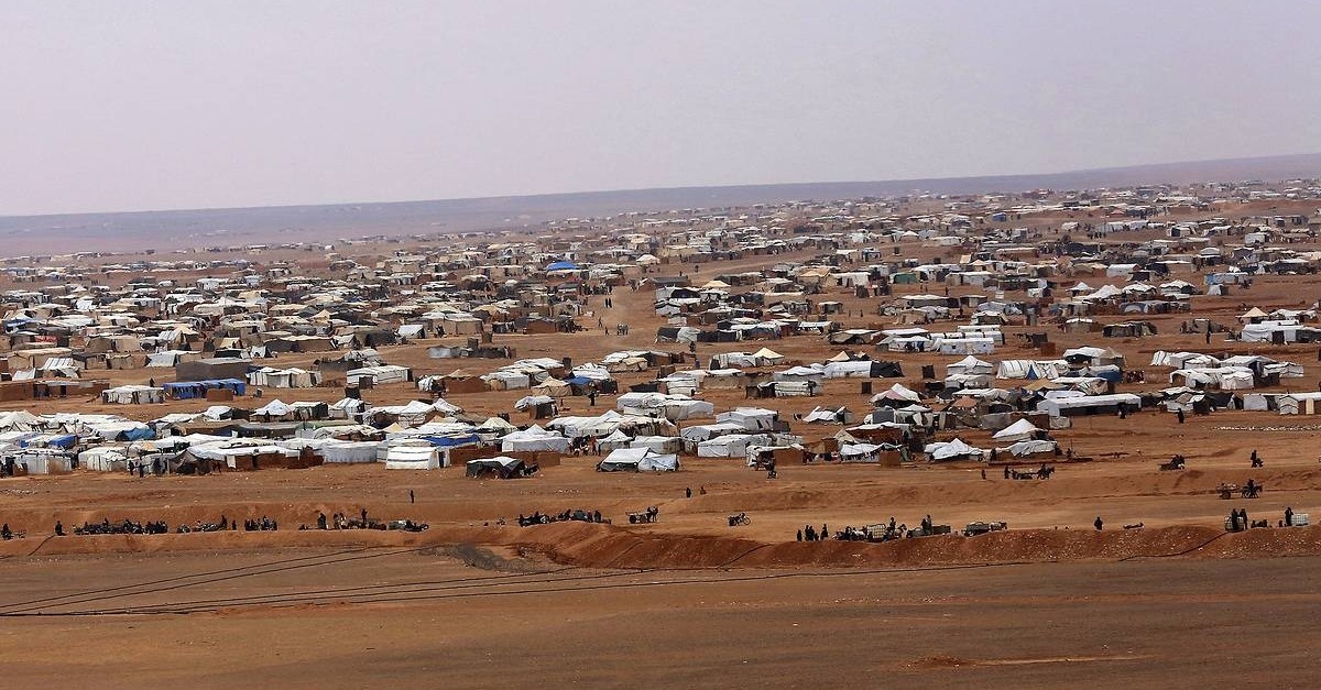 This file picture taken Tuesday, Feb. 14, 2017, shows an overview of the informal Rukban camp, between the Jordan and Syria borders. (AP Photo)