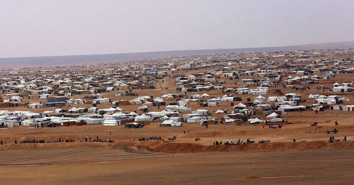 This file picture taken Tuesday, Feb. 14, 2017, shows an overview of the informal Rukban camp, between the Jordan and Syria borders. (AP Photo)