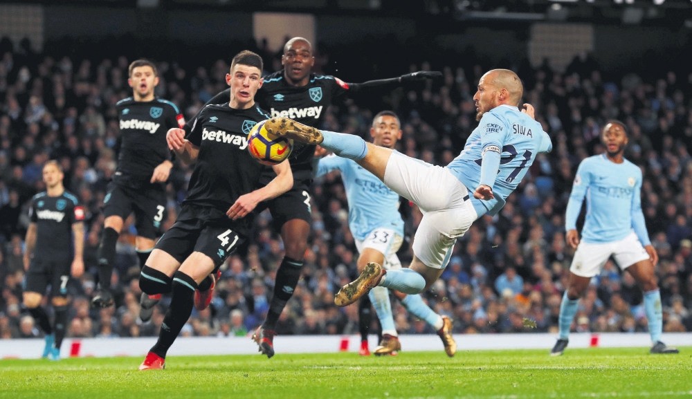 Manchester City's David Silva scores second goal against West Ham United at Etihad Stadium on Dec. 3.