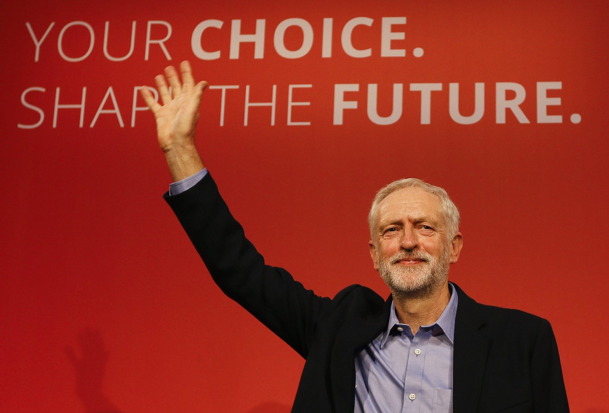 Jeremy Corbyn waves to supporters after he is announced as the new leader of the Labour Party during the partyu2019s leadership conference, London, Sept. 12, 2015. 