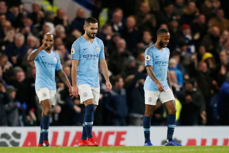 Manchester City players Fabian Delph (R), Raheem Sterling (L) and Ilkay Gundogan (C) react after Chelsea scored their second goal during an English Premier League football match at Stamford Bridge in London, Dec. 8, 2018. (AFP Photo)