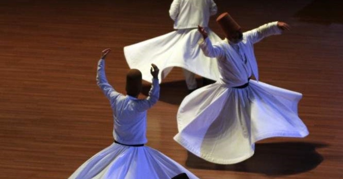 The dance of whirling dervishes generally accompanies Sufi music. (AA Photo)