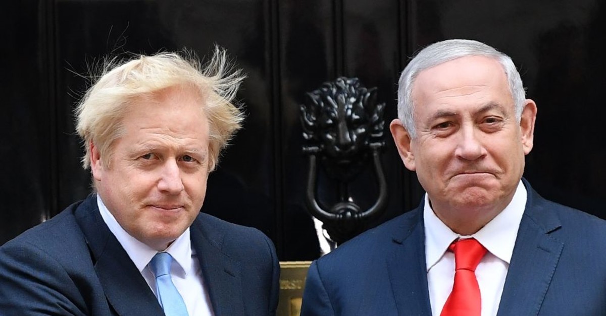 Britain's Prime Minister Boris Johnson (L) greets Israel's Prime Minister Benjamin Netanyahu outside 10 Downing Street, London, Sept. 5, 2019.