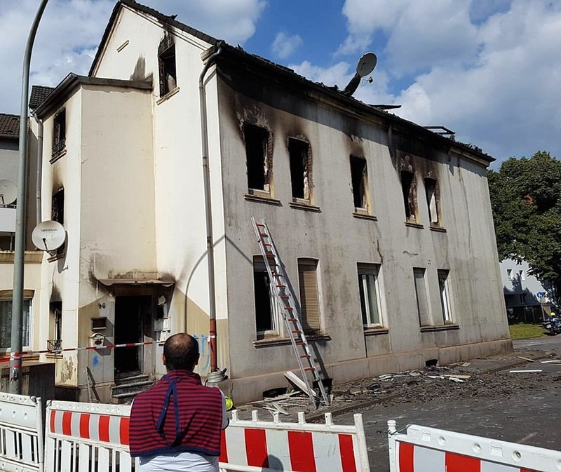 3-story building inhabited by migrants destroyed after suspected arson attack in Germany's Duisburg, Monday, Sept. 5, 2017 (IHA Photo)