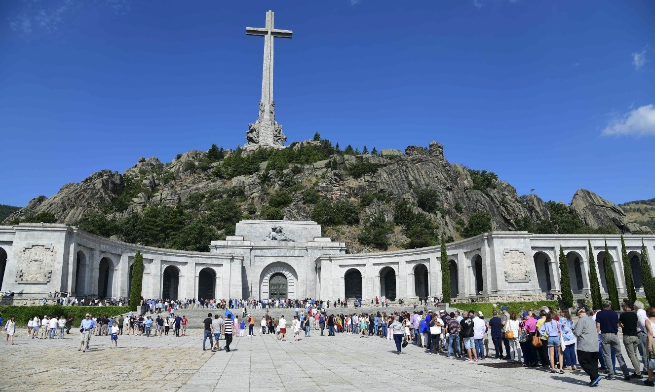 Visitors wait to enter the basilica where Francisco Franco is buried among thousands of Civil War dead of both sides at the Valley of the Fallen in San Lorenzo del Escorial, July 15, 2018.