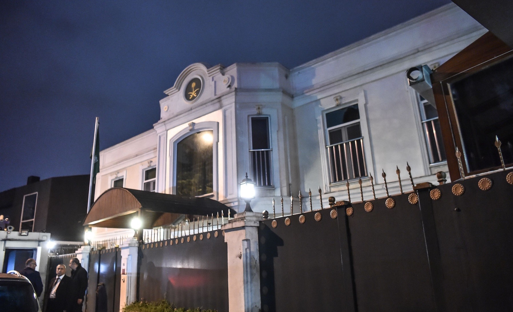 Security guards from the Saudi Consulate in Istanbul wait in front of the Saudi Consul's residence on Oct. 16, the day after Turkish police and prosecutors searched the consulate building.