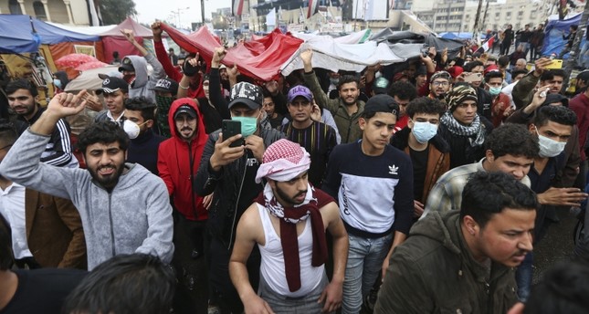 مقتل متظاهر وإصابة 17 آخرين في مواجهات مع قوات الأمن وسط بغداد