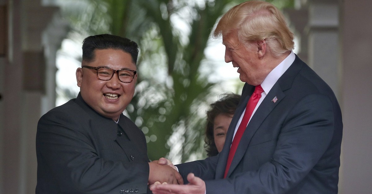 . S. President Donald Trump shakes hands with North Korea leader Kim Jong Un at the Capella resort on Sentosa Island Tuesday, June 12, 2018 in Singapore. (AP Photo)
