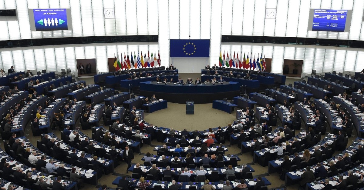 Members of the European Parliament take part in a vote during a plenary session, Strasbourg, France, Feb. 13, 2019. 