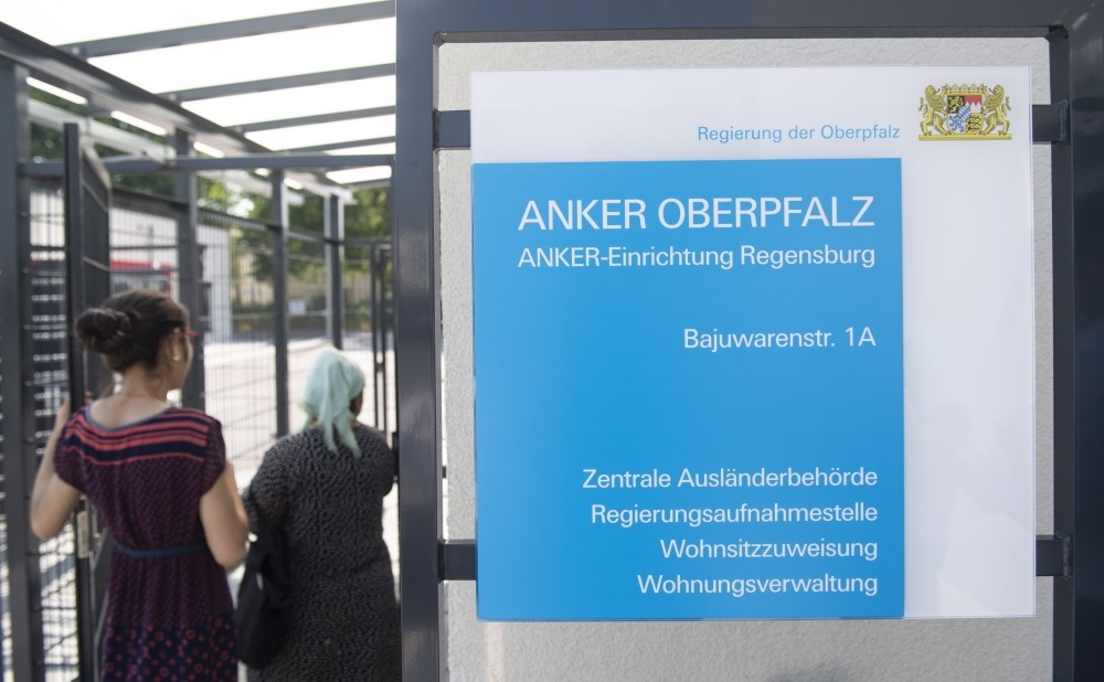 A board which reads u2018Anker Oberpfalz' (Anchor centers) in front of the reception and deportation center for refugees in Regensburg, Bavaria, August 1.
