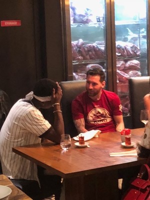 Pogba and Messi conversing.