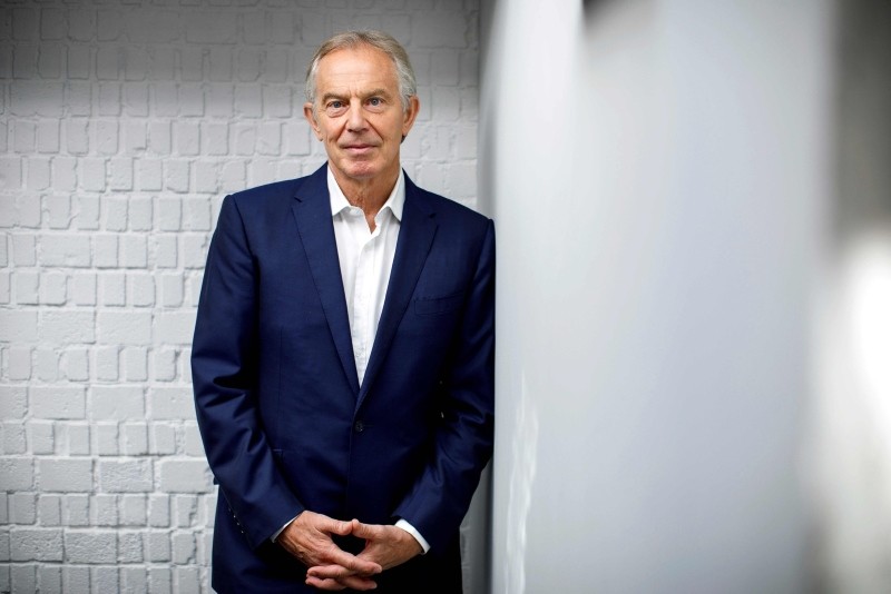 Former British Prime Minister Tony Blair poses for a photograph ahead of an interview with AFP in central London on July 17, 2018. (AFP Photo)