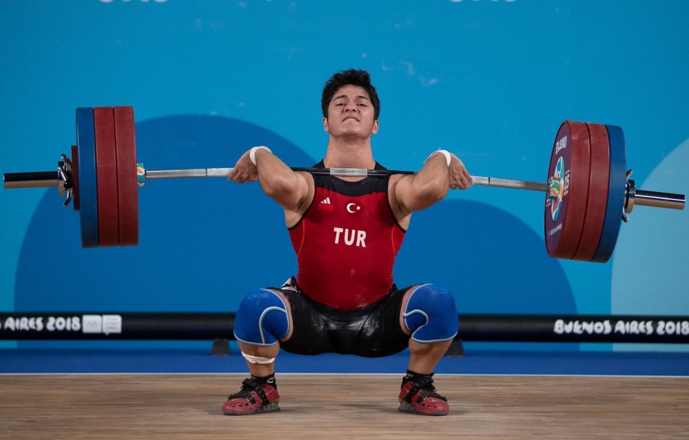Muhammed Furkan u00d6zbek in action during the Men's 56kg weightlifting competition, Youth Olympic Park, Buenos Aires, Oct. 9.