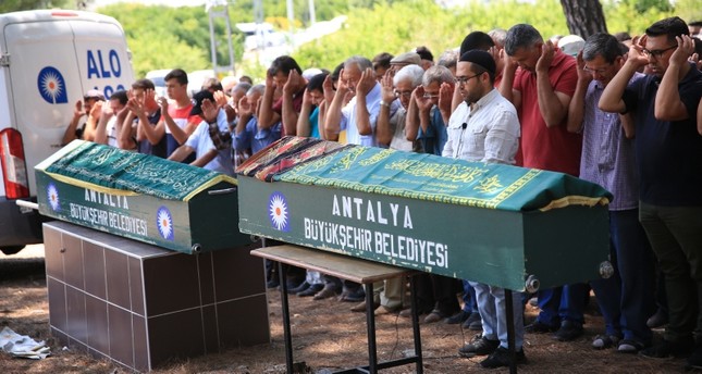 Relatives of YÄ±lmaz couple and their fellow villagers attend their funeral prayer in Akdamlar village, in Antalya, southern Turkey, on July 19, 2019. (AA Photo)