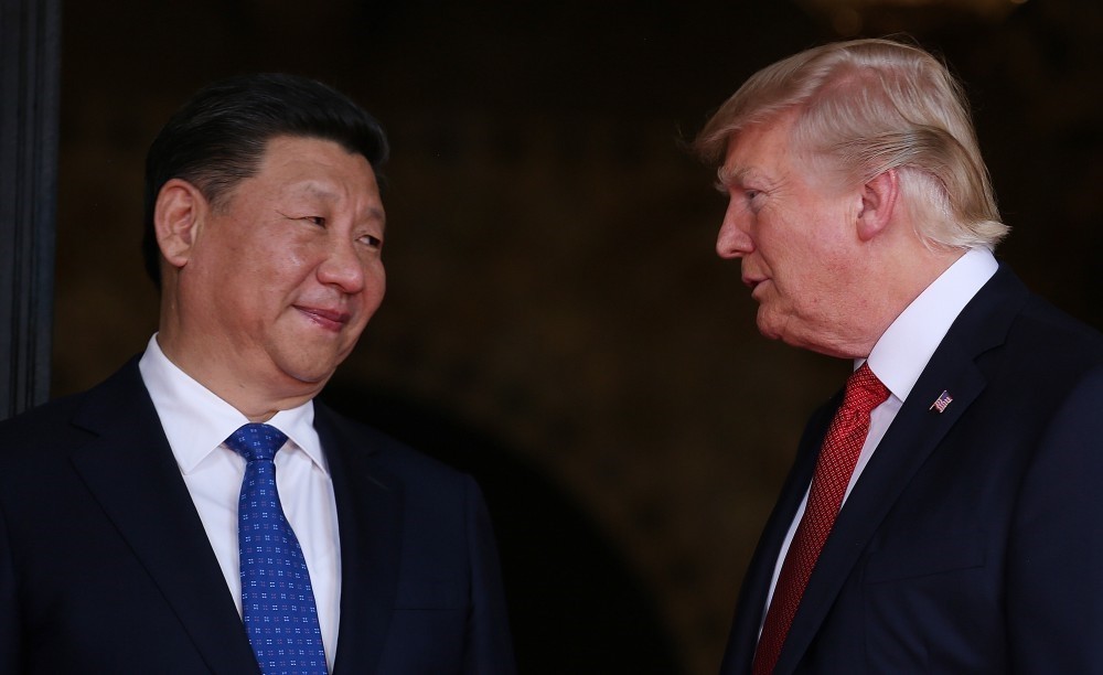 U.S. President Donald Trump welcomes Chinese President Xi Jinping at Mar-a-Lago state in Palm Beach, Florida.