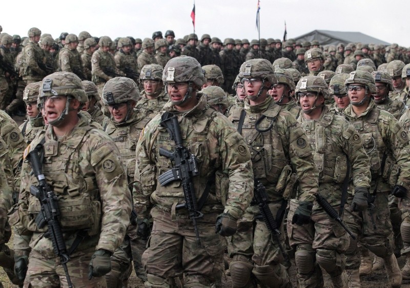 Soldiers of the 2nd Armored Cavalry Regiment of the U.S. Army during the welcome ceremony of the NATO Enhanced Forward Presence (eFP) contingent in the Military Training Center of the Land Forces in Orzysz, north Poland, April 13, 2017. (EPA Photo)