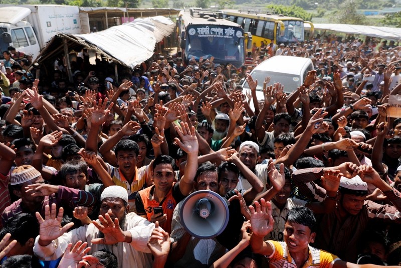 Rohingya refugees shout slogans during a protest against a disputed repatriation programme at the Unchiprang refugee camp near Teknaf, Bangladesh, 15 November 2018. (EPA Photo)