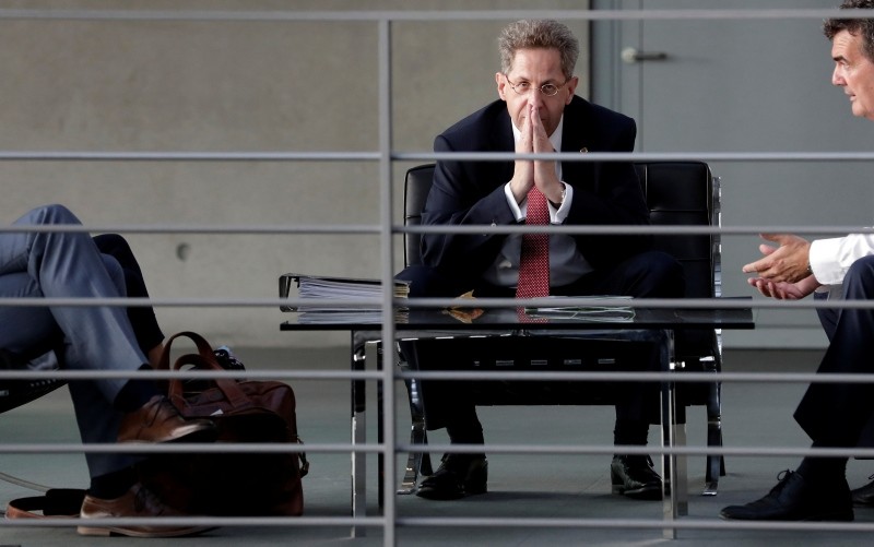 Hans-Georg Maassen (C), head of the German Federal Office for the Protection of the Constitution, waits for the beginning of a hearing at the home affairs committee of the German federal parliament in Berlin, Wednesday, Sept. 12, 2018. (AP Photo)