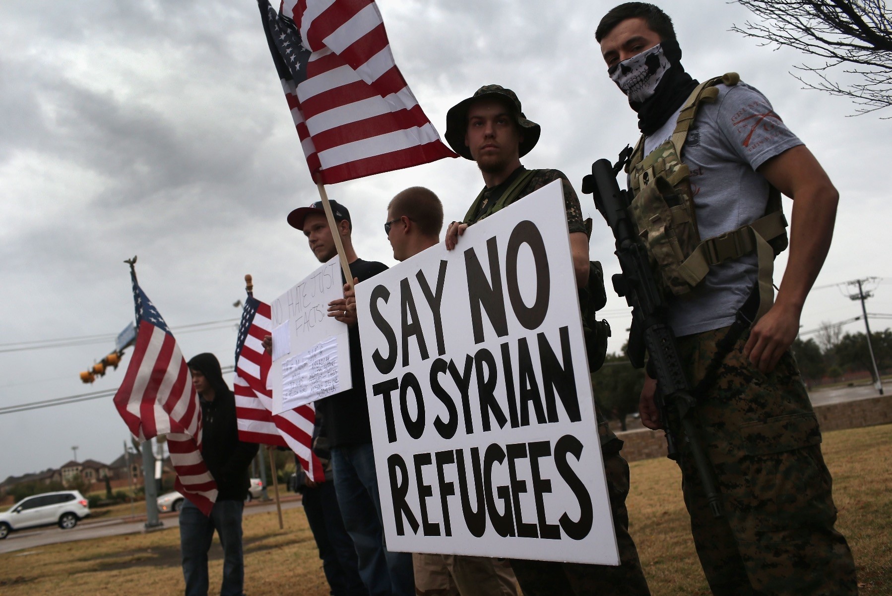 Armed protesters of a far-right U.S. group during a demonstration against Muslim refugees in front of a mosque in Richardson, Texas, Dec. 12, 2015.