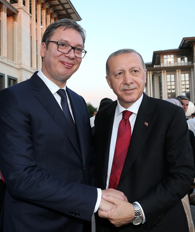 Serbia's President Aleksandar Vucic poses with Erdoğan.