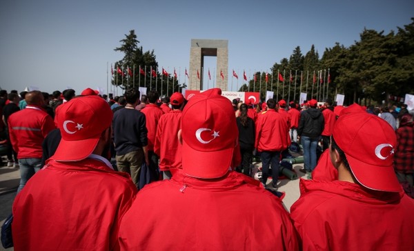 Hundreds of young Turks marched up the hill overlooking the cove, arriving at the memorial service to honor the Ottoman Empire's 57th Infantry Regiment, which staved off the Gallipoli landing. (AA Photo)