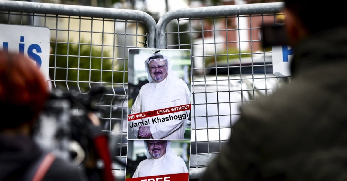 Posters of Jamal Khashoggi on the barricade in front of the Saudi Consulate in Istanbul during a protest, Oct., 14, 2018.