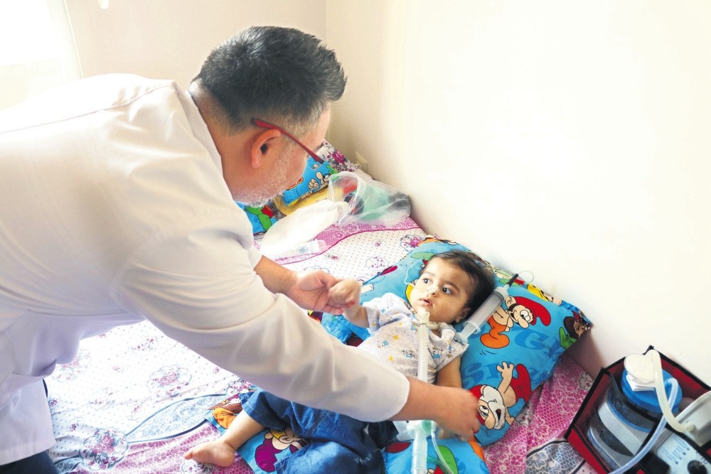 A Turkish doctor visits Mohammad at his family home in Gaziantep.