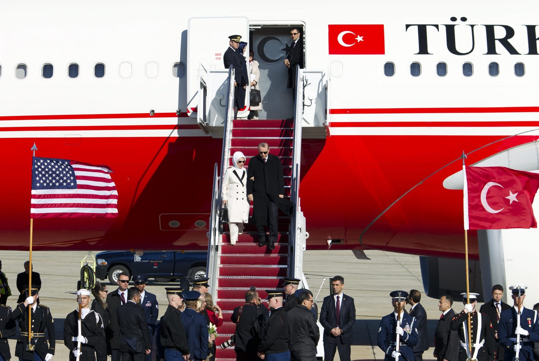  President Recep Tayyip Erdou011fan accompanied by his wife Emine walk down the stairs upon his arrival at Andrews Air Force Base, Md., Tuesday, March 29, 2016. (AP Photo)