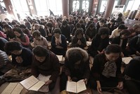 Parents pray for their children's success in the Scholastic Aptitude Test at the Jogye Temple in Seoul, South Korea, Wednesday, Nov. 15, 2017 (AP Photo)