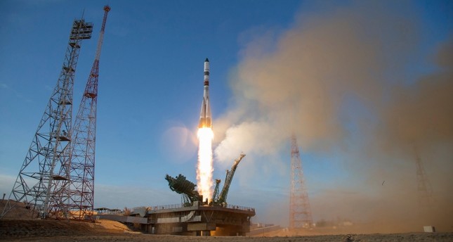 لحظة انطلاق الصاروخ سويوز من قاعدة بايكونور في كازاخستان AP