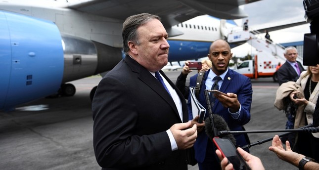 U.S. Secretary of State Mike Pompeo speaks to reporters before boarding his plane at the Mexico City International Airport on Friday, Oct. 19, 2018. (AP Photo)
