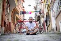 Yapar's red bike became more than a vehicle of transportation. For Yapar, it is a mean to help people in need.
