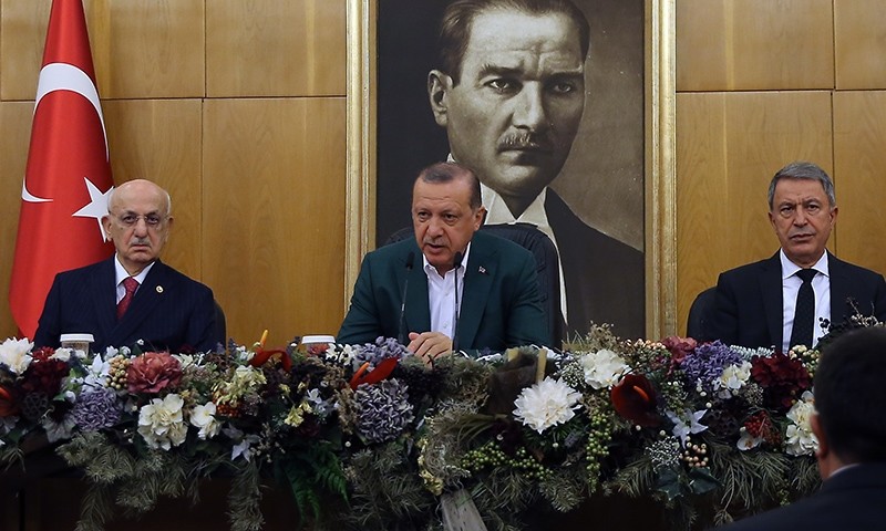 President Recep Tayyip Erdou011fan (center) holds news conference ahead of his departure to New York to attend the 72nd session of the UN General Assembly (AA Photo)